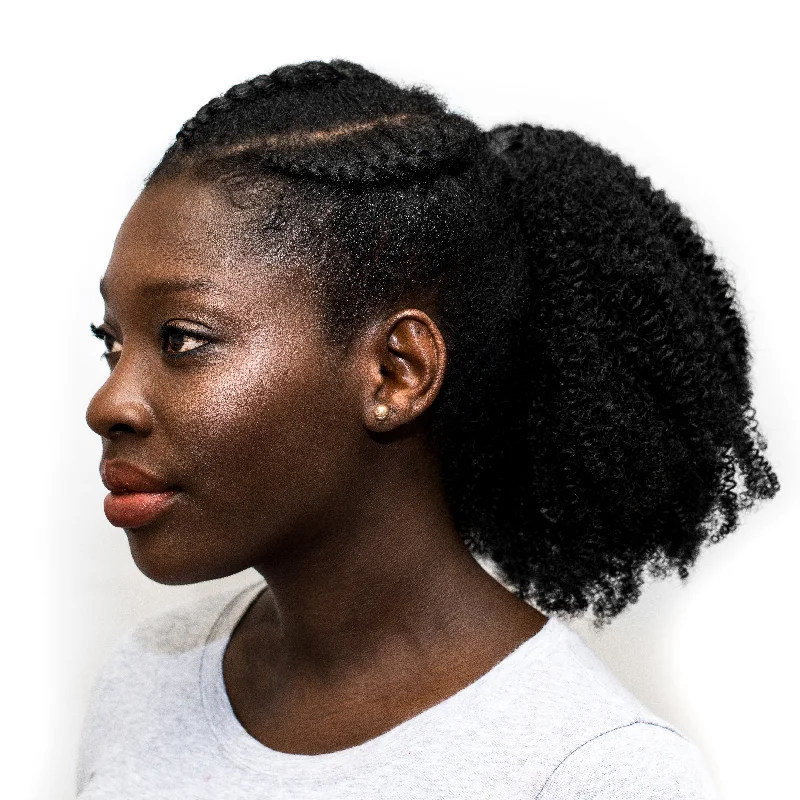 High - volume ponytails for a bold and glamorous appearanceAfro Ponytail