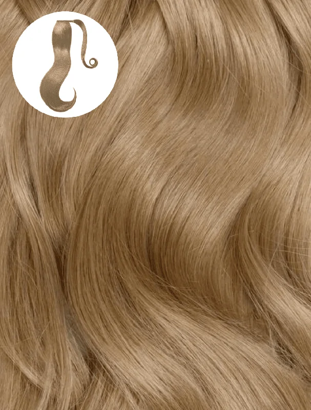 Curly ponytails with tight ringlets for a playful and feminine vibeAsh Brown (8) Ponytail