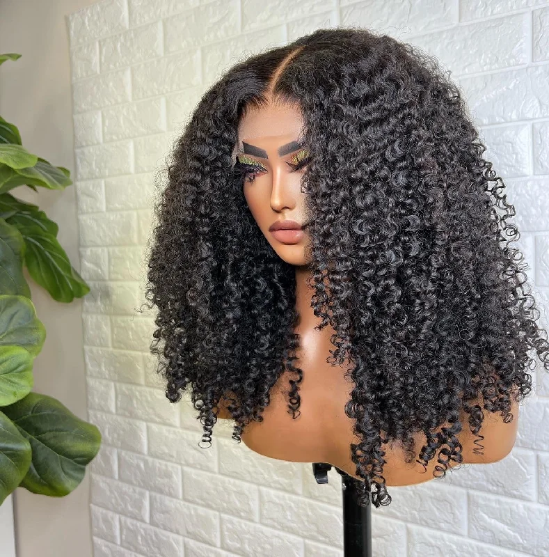 Curly wig with a 220 - density for an extra - full appearanceSOPHIE RAW ELITE  CUSTOM UNIT KINKY CURLY 5x5 CLOSURE WIG