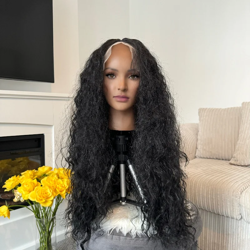 Curly wig with a side - part for a more flattering lookKimaira 26" Curly Black Synthetic Lace Front Wig