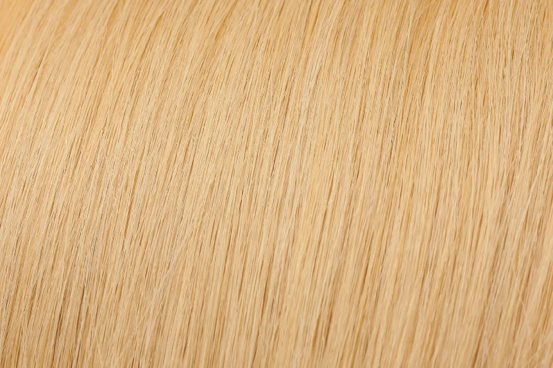 Human - hair clip - in hair extensions for a natural and luxurious lookSeamless Clip-In Extensions: Dark Golden Blonde #26